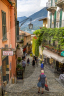 View of shops on cobbled street in Bellagio, Province of Como, Lake Como, Lombardy, Italy, Europe