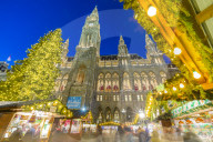 Rathaus and Christmas Market at night in Rathausplatz, Vienna, Austria, Europe