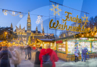 Rathaus and Christmas market stalls at night in Rathausplatz, Vienna, Austria, Europe