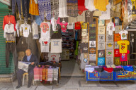 Colourful clothes, Souk Khan al-Zeit Street in Old City, Old City, UNESCO World Heritage Site, Jerusalem, Israel, Middle East