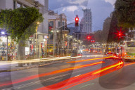 View of Isrotel Tower and trail lights at dusk, Tel Aviv, Israel, Middle East