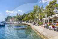 View of boats and old town restaurants in Cavtat on the Adriatic Sea, Cavtat, Dubronick Riviera, Croatia, Europe