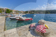 View of harbour boats and Cavtat on the Adriatic Sea, Cavtat, Dubronick Riviera, Croatia, Europe
