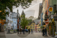 View of visitors taking an evening walk on Vorderstadt, Kitzbuhel, Austrian Tyrol Region, Austria, Europe