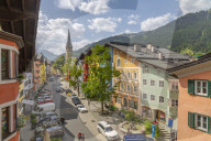 View of colourful buildings on Vordastadt from hotel window, Kitzbuhel, Austria, Europe