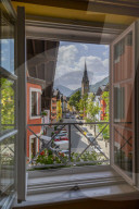 View of colourful buildings on Vordastadt from hotel window, Kitzbuhel, Austria, Europe