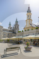 View of St. Michaelskirche and Salzburg Cathedral in Residenzplatz, Salzburg, Austria, Europe