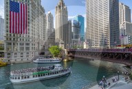 View of American flag on the Wrigley Building and Chicago River, Chicago, Illinios, United States of America, North America