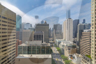 View of Chicago skyline from hotel window on Michigan Avenue at dusk, Chicago, Illinios, United States of America, North America