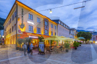 View of restaurant on Hauptplatz at dusk, Schladming town, Styria, Austrian Tyrol, Austria, Europe