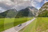 View of road leading into mountains, Unterburg, Styria, Tyrol, Austrian Alps, Austria. Europe