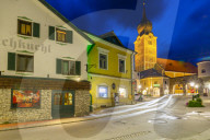 View of church and local buildings at dusk, Schladming, Styria, Austrian Tyrol, Austria, Europe