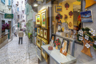 View of local souvenirs on cobbled street in the old town, Rovinj, Istria, Croatia, Adriatic, Europe