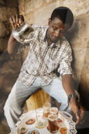Man making traditional tea, Accra, Ghana, Africa