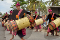 Drummers leading a traditional Sasak wedding procession.