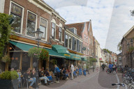 People sitting outside Springhaver Theater in Utrecht, Netherlands.