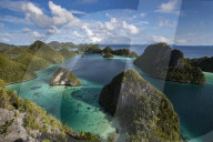 Aerial view of lagoon and karst limestone formations in Wayag Island, Raja Ampat, West Papua, Indonesia
