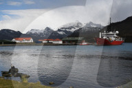 King Edward Point research station with fisheries patrol boat Pharos alongside at the jetty, South Georgia