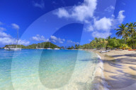 Saltwhistle Bay, white sand beach, turquoise sea, yachts, palm trees, Mayreau, Grenadines, St Vincent, Caribbean