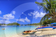 Colourful boat, white sand beach, turquoise sea, palm trees, yachts, Saltwhistle Bay, Mayreau, Grenadines, St Vincent, Caribbean