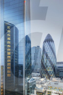 The City of London financial district skyline showing the Scalpel building (52-54 Lime Street) and the Gherkin (30 St. Mary Axe)