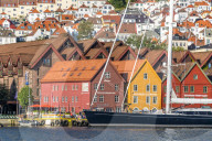 Sail boat on waterfront of Bryggen Old Town, UNESCO World Heritage Site, Bergen, Hordaland County, Norway