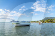 Fishing boats moored in the tropical lagoon, La Gaulette, Black River district, Indian Ocean, Mauritius