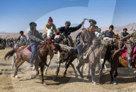 Men practising a traditional Buzkashi game, Yaklawang, Afghanistan