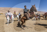 Men practising a traditional Buzkashi game, Yaklawang, Afghanistan
