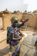 Local girls on a water well in Yaama, Niger