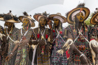 Wodaabe-Bororo men with faces painted at the annual Gerewol festival, courtship ritual competition among the Woodaabe Fula people, Niger