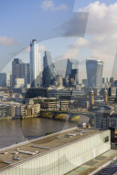 City of London skyline with Tate Modern art gallery in the foreground, London, England