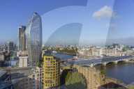 Blackfriars Bridge, River Thames and city skyline. Tall glass tower is One Blackfriars also known as The Vase, London, England