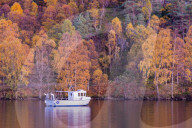 Boat moored at Loch Katrine, Autumn Colours, The Trossachs, Scotland, United Kingdom, Europe.