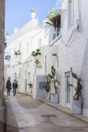 Narrow white street in the historic centre of Monopoli, Apulia, Italy, Europe.