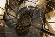Low angle view of spiral staircase in the Stadtturm tower. Innsbruck, Tyrol, Austria, Europe.