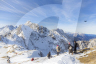 Tourists descends from Hafelekar peak, the top of ski resorts of Innsbruck, Tyrol, Austria, Europe.