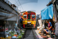Train going through Maeklong Railway Market, Bangkok, Thailand, Southeast Asia, Asia