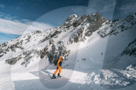Snowboarder going down the slope at La Plagne ski resort, French Alps, Tarentaise, France, Europe