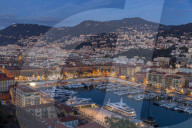Elevated view from Castle Hill down to Port Lympia at dusk, Nice, Cote d'Azur, French Riviera, France, Europe
