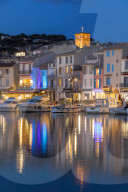View from the port to the old town at dusk, Cassis, France, Europe