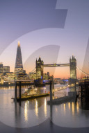 The Shard and Tower Bridge at sunset on the River Thames, London