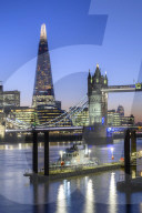 The Shard and Tower Bridge with Navel vessel on the River Thames, London