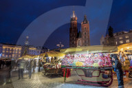 Christmas markets at night with Saint Mary's Basilica, Market Square, Krakow, Poland