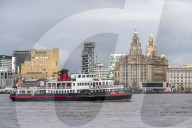 The mersey ferry Royal Iris sailing passed the Liverpool waterfront, Liverpool, Merseyside, UK