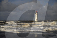 New Brighton lighthouse during stormy conditions, The Wirral, Cheshire, UK