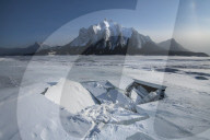 Ice fracture at Abraham Lake frozen with Mount Michener, Alberta, Canada
