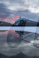 Reflections at sunrise of Mt Rundle, Vermilion Lakes in the Canadian Rocky Mountains, Alberta, Canada.