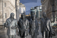 The Beatles statue sculpture at Pier Head on Liverpools waterfront, Liverpool, Merseyside