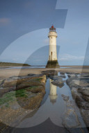 Perch rock lighthouse refelcted in rockpool, New Brighton, Cheshire